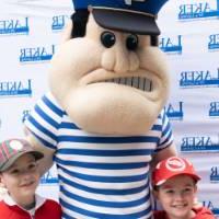 Louie the Laker poses with two young boys